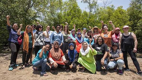 group photo of women's group in mangroves
