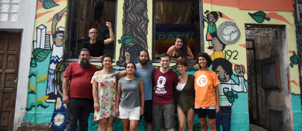 Group photo of Friends of the Earth Brazil in front of the Casanat social centre