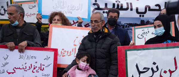 Palestinians stand in solidarity with the people in Sheikh Jarrah